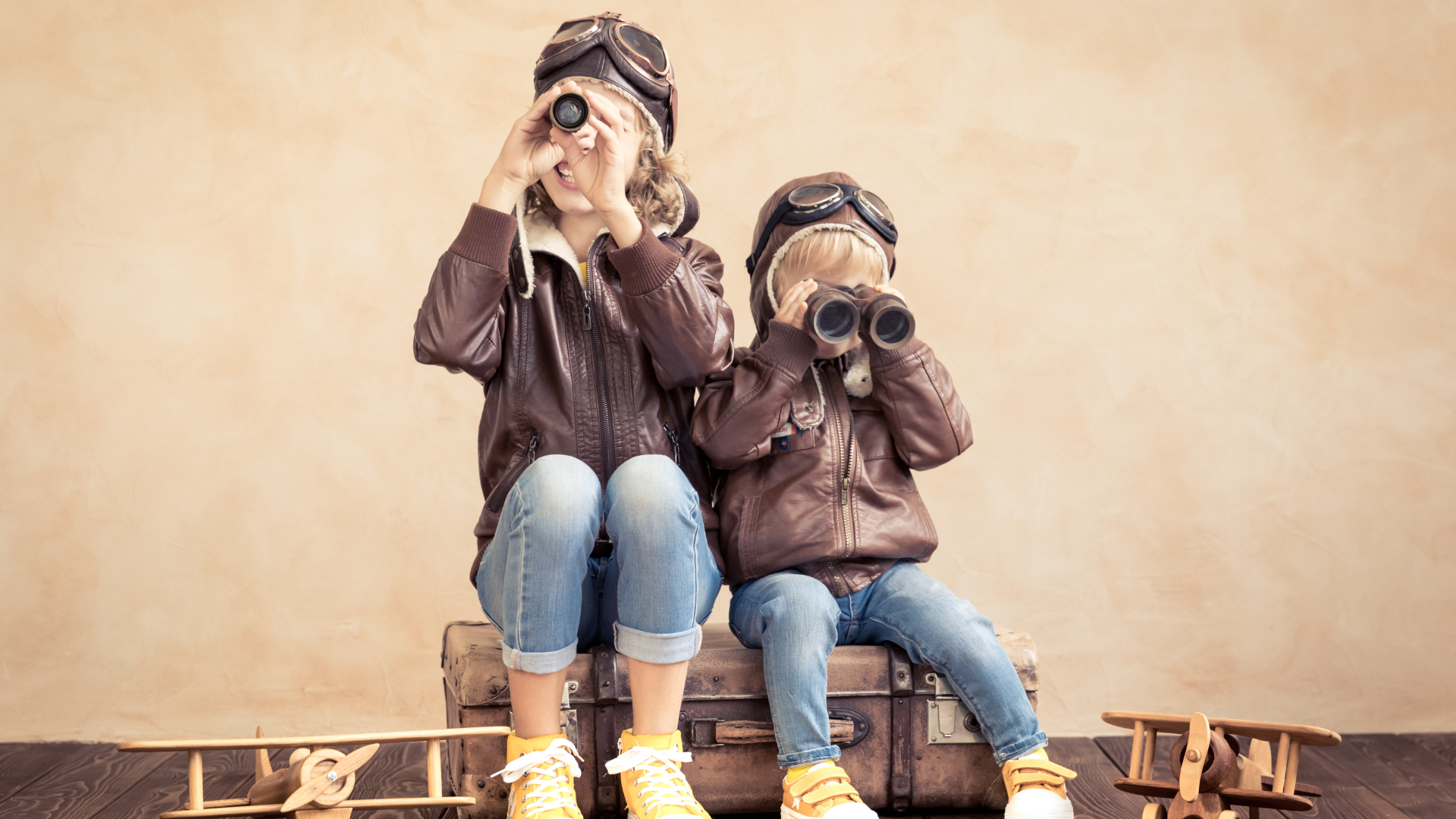 two children with binoculars